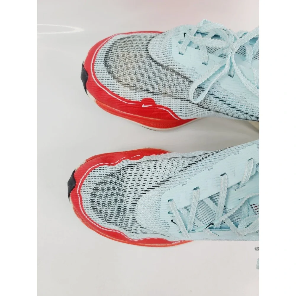 Nike, Athletic ZoomX Vaporfly Next% Running Shoes, Men, Size 9.5 Light Blue/Red.